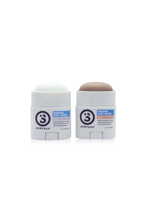 Surface SPF45 Zinc Oxide 0.5OZ Facestick- Both Tinted and White side by side with lid off