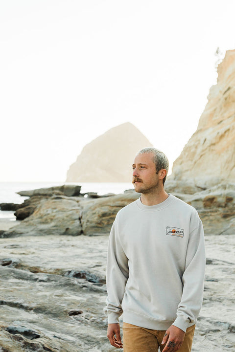 Moment The Classic Pullover Crew - Faded Bone - Model walking toward camera