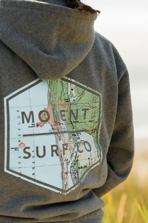 Closeup of the Moment Boxed Topo Logo Pullover Hoodie - Gunmetal Heather's back design.